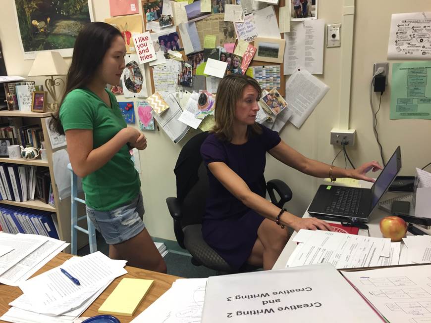 Junior Jennifer Cheung and teacher sponsor Nikki Lehman discuss strategies for new tutors.