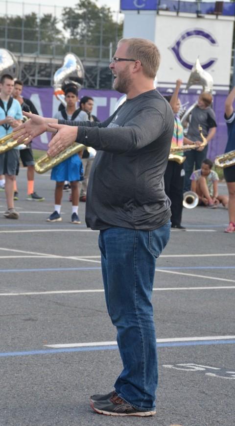 Chris Riechers leads the band through their practice.