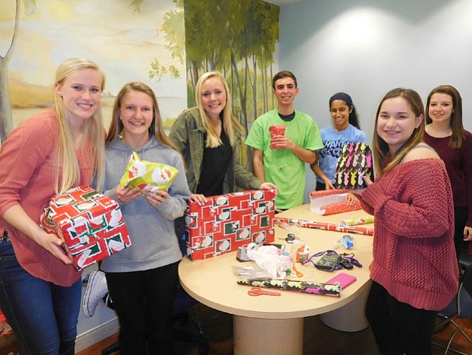 Students bring holiday spirit to homeless children at Katherine Hanley Shelter