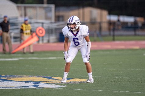 Senior and varsity linebacker Ethan Bernet waits in coverage  in the Robinson game Aug. 31.  