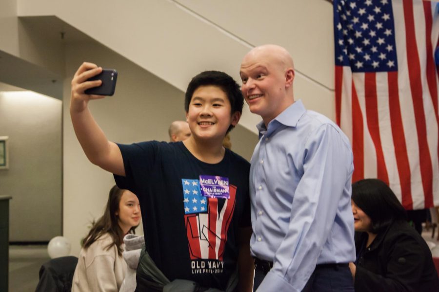 FCPS Board Member Ryan McElveen poses while taking a selfie with a student during his kickoff party. The event gave McElveen the opportunity to get to know his supporters and families from the community better.