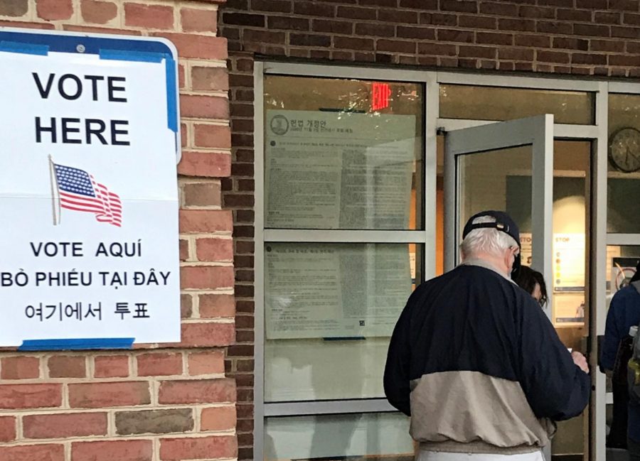 People enter an early voting station in Falls Church on Oct. 14.