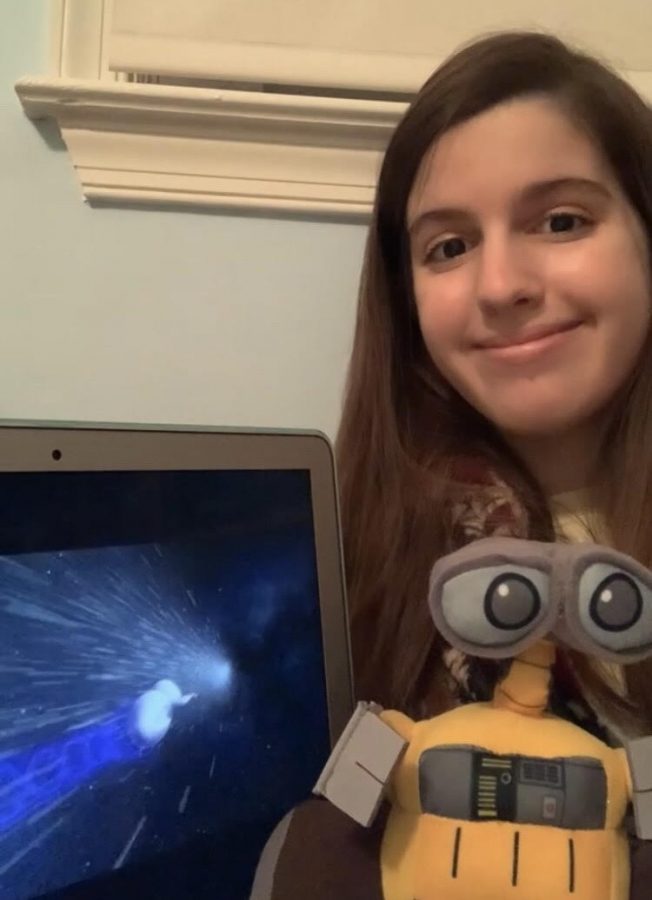 At home, sophomore Anna Dimaiuta spends her evening watching her favorite Disney move WALL-E with her own WALL-E.