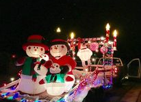 English teacher Deborah Wydra participates in a Christmas parade every year and her family decorates the car to use as a float.