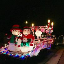 English teacher Deborah Wydra participates in a Christmas parade every year and her family decorates the car to use as a float.