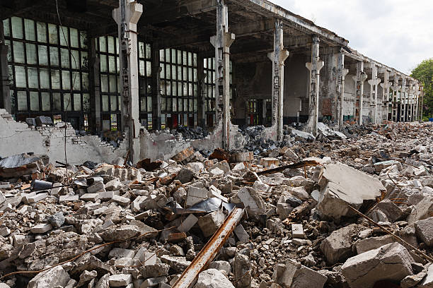 This image depicts a destroyed factory in Yemen. Yemen is facing a large humanitarian crisis right now.