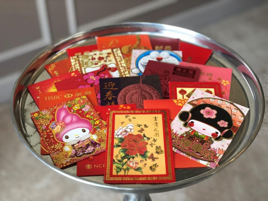 Giving red envelopes, or 紅包, is also an important tradition during Chinese New Year. Relatives give kids these pockets that contain money. They come in many different shapes, sizes, designs and colors. Red envelopes also serve as congratulatory gifts at weddings or births. “I call my grandparents in Taiwan [and get] red envelopes.” freshman Stephen Tsai said.