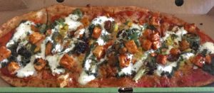 Harshini Doguparthi ordered a custom pizza with tofu, broccoli, bell pepper, roasted corn and jalapenos, topped with basil and parmesan drizzle from Gusto Farm to Street on April 27.