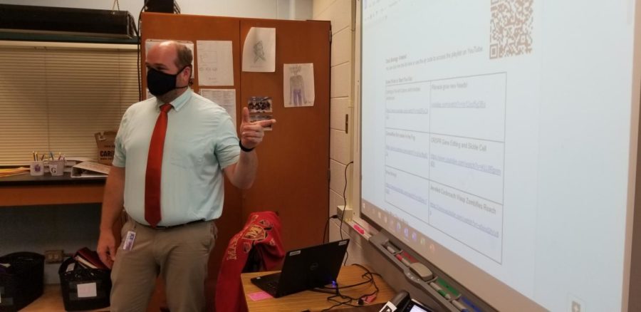 Science teacher Peter Bouwman instructs his students on Sept 20.