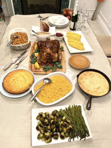 Thanksgiving dinner made for a family of five had plenty of leftovers. Senior Emily Gates enjoys mixing macaroni and turkey to create turkey macaroli.