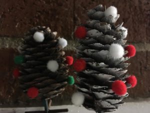 Using hot glue, to glue the pinecone Christmas tree together, will make it more stable.