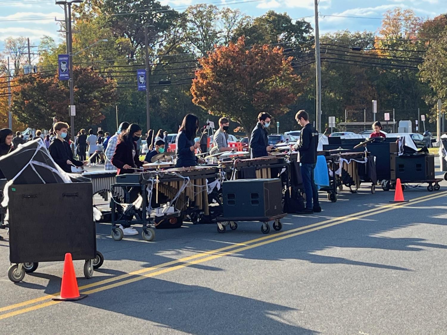 The front ensemble practices the marching band show, “A Night at the Graveyard”, after-school, Nov. 4.