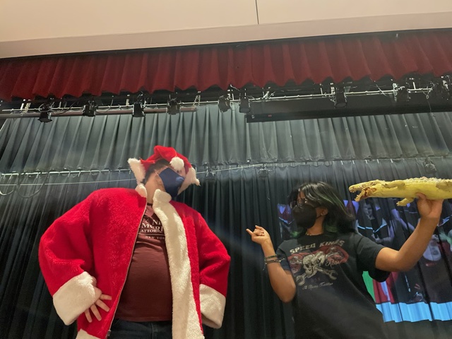 In the auditorium, senior Tyler Hicks, who plays Santa, and senior Harini Bachu, prepare for the theaters Tiny Tots performance. 