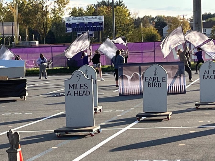 The color guard warms up with their flags on Nov. 4.
