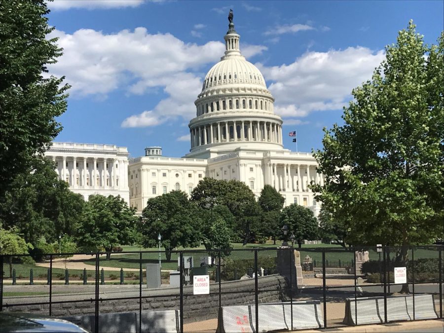 The fencing on the Capitol remains standing even into June to protect the Capitol Building after the insurrection on Jan.6. Photo by Kristine Brown.