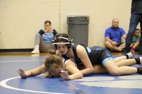 During the 2021 VAWA Freestyle States event on May 8-9 at Riverbend High School in Fredericksburg, sophomore varsity wrestler Erin Meymarian takes down opponent Samantha Jurgens of Grizzly Wrestling club. Meymarian placed 2nd.