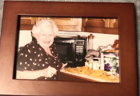 Freshman John Powers’ great grandmother preparing the cheese straws dish for the first time in the family, starting the tradition.