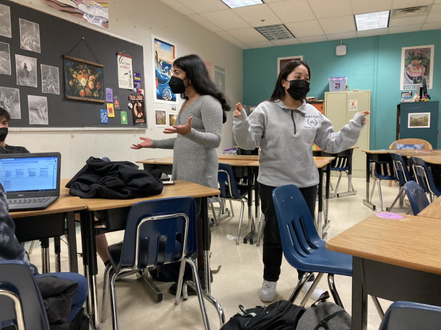 On Feb. 24, senior and debate head-captain Noyanika Vattathara and junior Tiffany Suarez lay out strategies for team newer team members to follow for competition. 