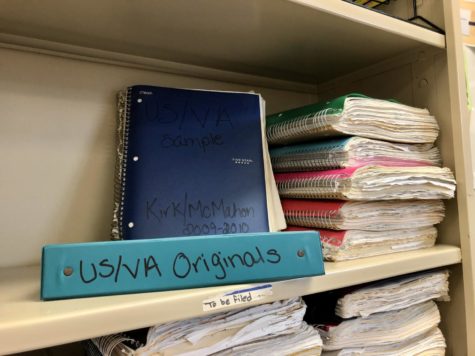 Notebooks stacked up on the shelves in social studies teacher Michael Kirk’s room keep track of how the course U.S. Virginia History has developed over the years. Some of them can date back to more than 10 years ago.