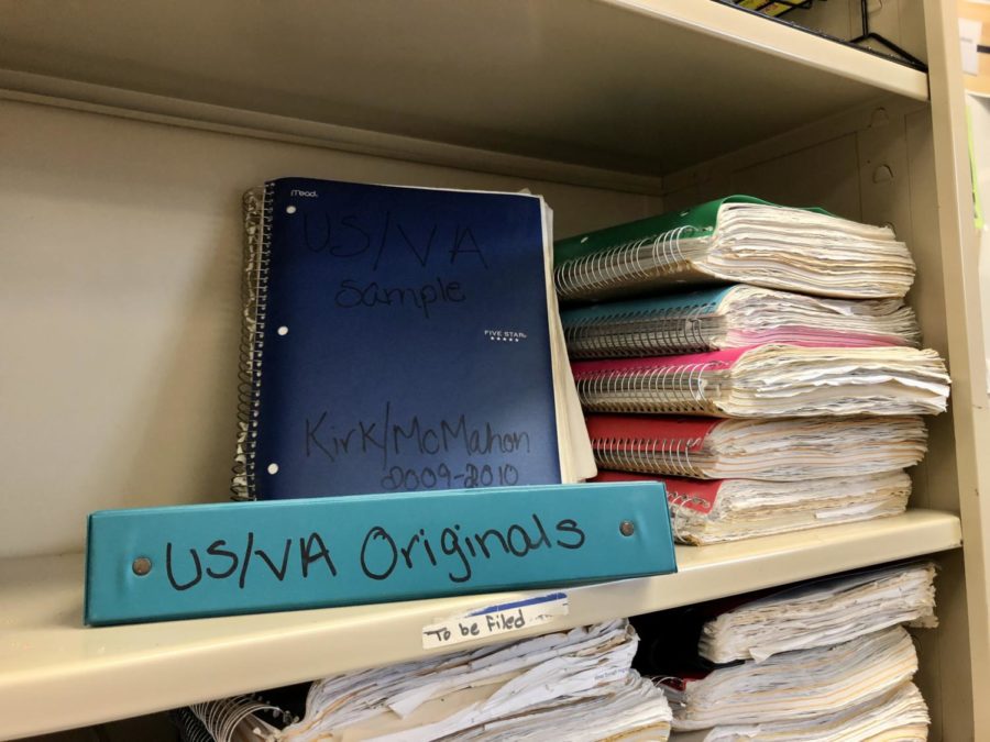 Notebooks+stacked+up+on+the+shelves+in+social+studies+teacher+Michael+Kirk%E2%80%99s+room+keep+track+of+how+the+course+U.S.+Virginia+History+has+developed+over+the+years.+Some+of+them+can+date+back+to+more+than+10+years+ago.