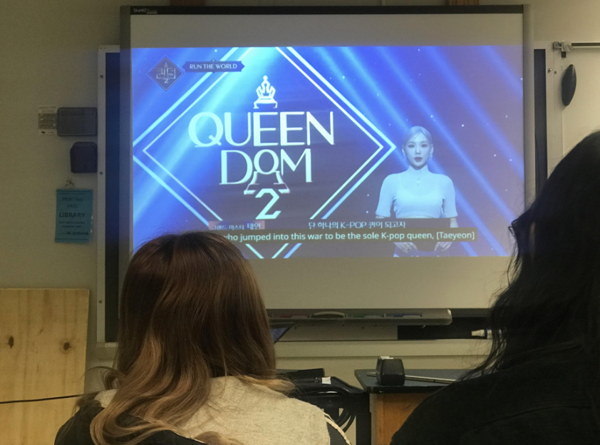 Queendom 2 is a survival Korean television show that sets female idol soloists and groups against each other in a competition each week. According to Teen Vogue, This is the sequel to Queendom, a show that aired in 2019 on Mnet, which let groups like Oh My Girl and MAMAMOO compete for the crown. 
