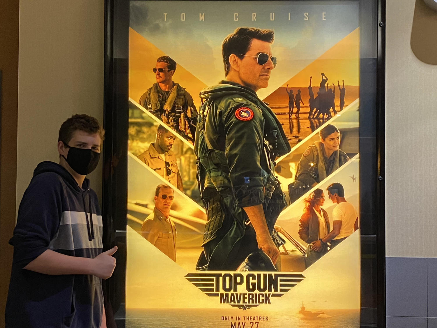 On May 6, 2022, Andrew Reynolds went to Fairfax Towne Center movie theater where he saw a poster for “Top Gun: Maverick” which he plans to go see when it releases.