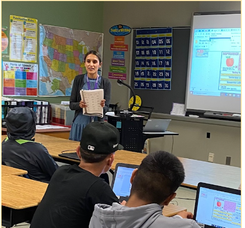 ESOL teacher Cristy Ryman hands out a word search as an activity while teaching her fifth period class.