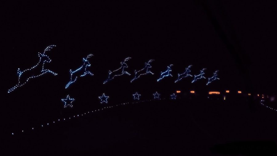 A row of leaping reindeers light up the driveway, guiding viewers to their final destination of the festival—the Holiday Village located at the end of the light show.