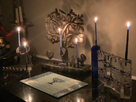 Senior Sam Massi celebrates Hanukkah with her family by lighting menorahs, which represent the miracle of the oil lasting eight days. Picture used with permission of Sam Massi.