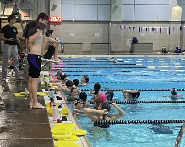 The girls and boys swim team practices in the competition pool at Cub Run Rec Center on Nov. 28.