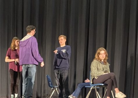During rehearsals of “Work in Progress” theater arts director Andrew Shaw presents seniors Alli Baxter, Zach Smith and Samantha Massi with constructive criticism. 

