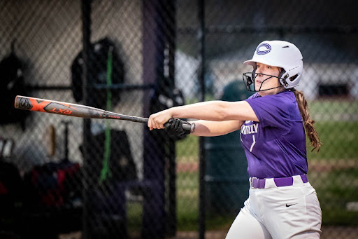 Varsity softball senior, Rachel Dawson, practices batting during practice on April 10, 2023.