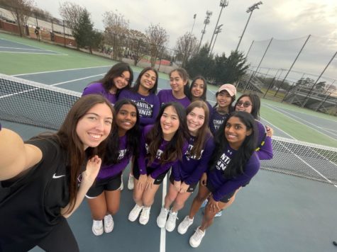 After practice on April 20, Coach Anna and the varsity girls team take a group selfie to put a wrap on the day. (Photo Provided by Anna Klinker)
