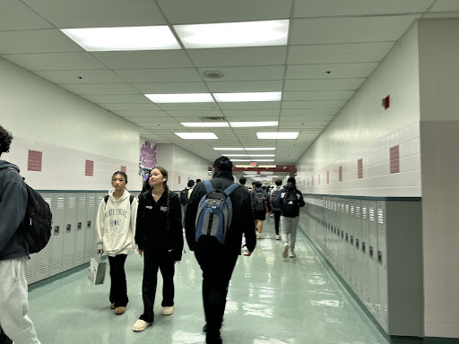 Students rush to class as the passing period music plays on May 4. Photo by Gaby Gutierrez.