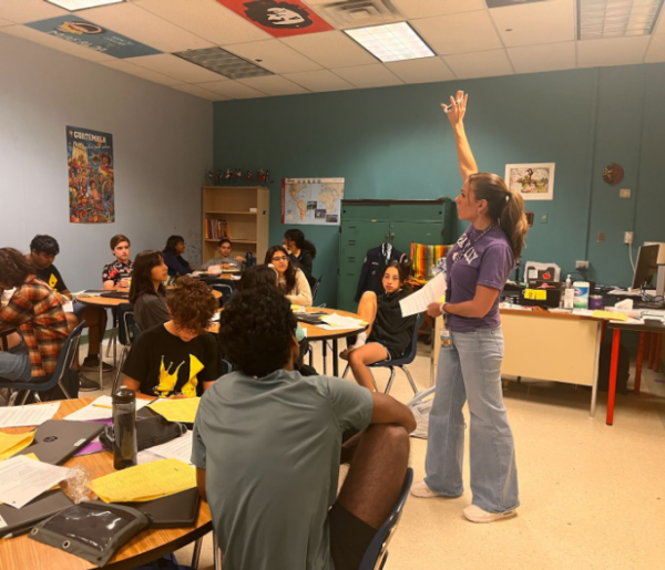 Spanish teacher Elisabeth Rosario gives instructions for an assignment to her fifth period Spanish class.