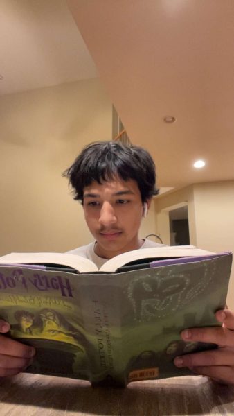 Freshman Ruhan Asthana reads the sixth book in the Harry Potter Series, “Harry Potter and the Half Blood Prince.”