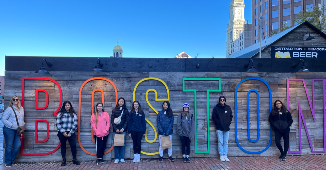 Journalism teacher Kristine Brown, junior Patricia Aguila, junior Delaney Brooks, sophomore Claire Baek, sophomore Phoebe Methvin, junior Lizzie Sun, junior Alexis Huff, English teacher Luc Nguyen and freshman Bianca Carmona pose in front of a Boston sign as part of a field trip to the national student journalism convention with over 4,400 high school student and advisers.
Photo used with permission of Kristine Brown