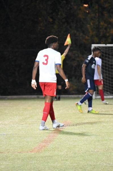 Senior Cyrille Tchokokam defends a zone while his team tries to win the ball back against Bethesda MLS next. Alexandria MLS next won 3-1.