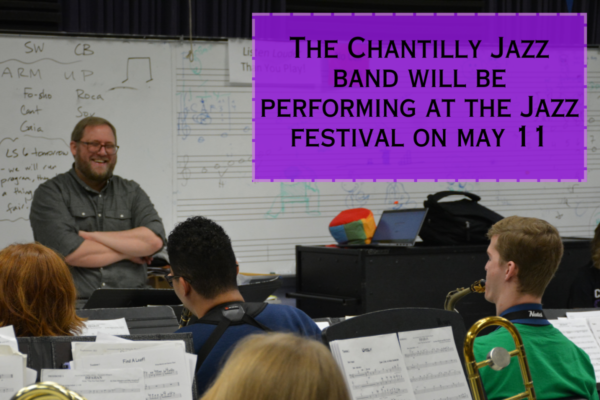 Jazz band teacher Christopher Riechers listens as the jazz band performs on March 15. The group has been preparing for their performance in the CHS Jazz Festival on May 11. Photo by Tyler Ellison.