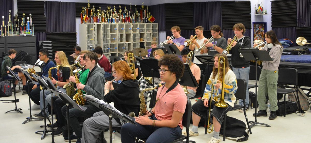 The CHS Jazz Band rehearses their music on March 15. The band consists of the woodwinds (front row), the brass (middle and back rows) and the rhythm section encompasses the drums, bass, piano and guitars. Jazz bands may also have vocalists depending on the song. Photo by Tyler Ellison.