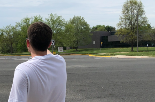 Junior Ian Labas explains the dangers of the north entrance to the CHS campus on April 17. 
