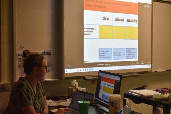 Biology and oceanography teacher Victoria Tripp teaches claim, evidence and reasoning to her fifth period class. 
