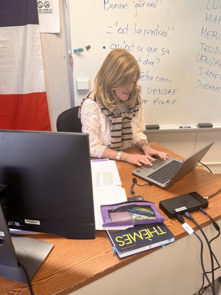 French teacher Christine Besen prepares for class during a passing period on Sept. 10.
