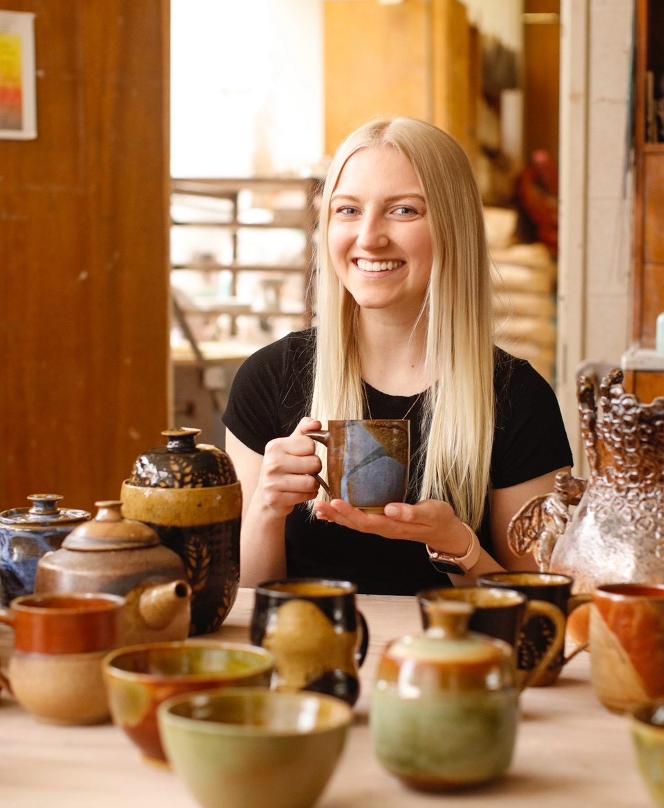 Art teacher Danielle Kennedy shows the pottery that she made.

Photo courtesy of Danielle Kennedy