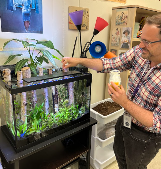 Aside from languages, Spanish teacher Timothy Allen enjoys learning about nature and tending to his fish tank. 