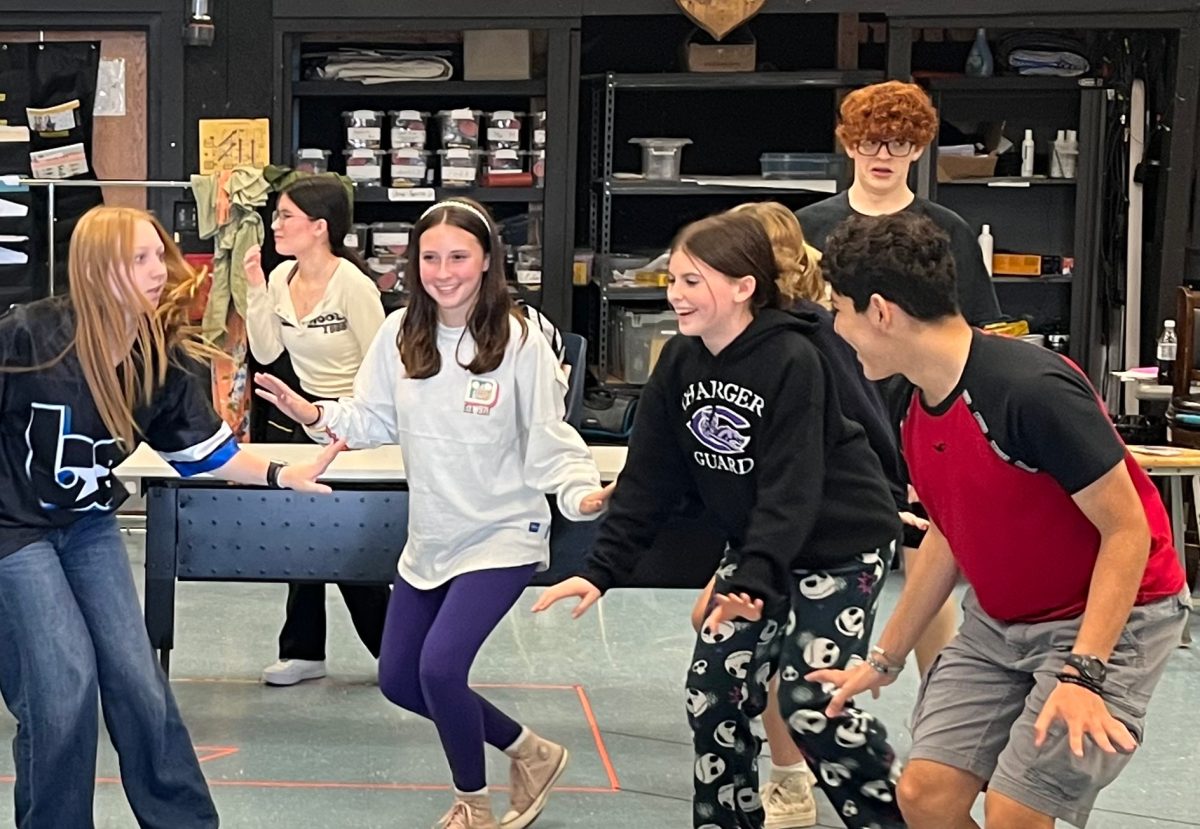 The cast of “Matilda” runs through a number during after-school rehearsal on Oct. 8.