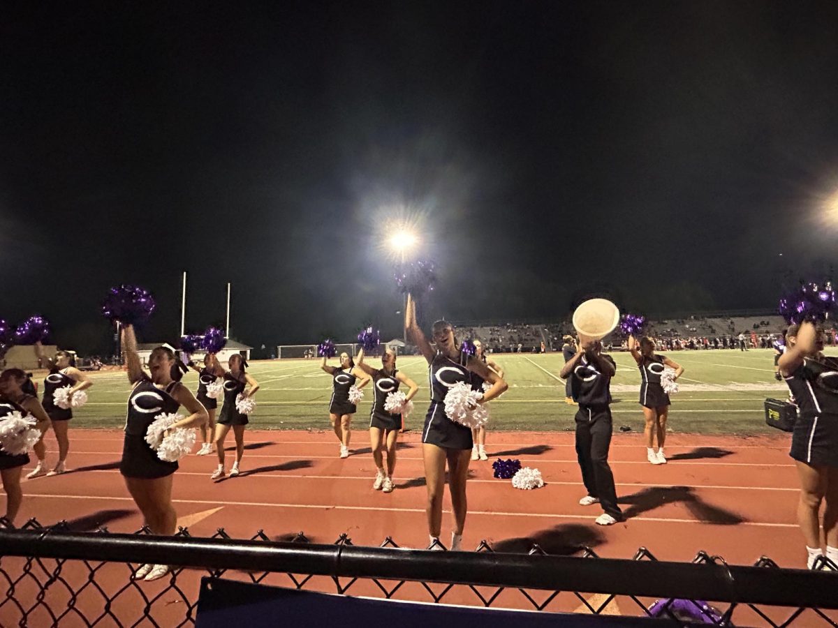 The CHS cheer team chants at the game against Hayfield on Sept. 20. 