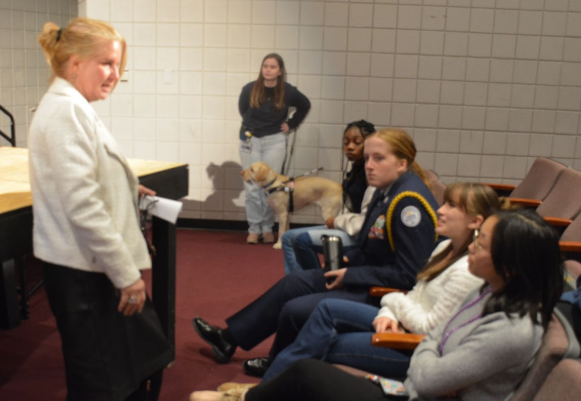 Director of Student Services Amy Parmentier talks to senior Delaney Brooks, freshman Kailah Rose, junior Carmen Thomason, senior Emily Raimist and junior Reagan Shin. They are the student panelists who will answer questions regarding their experiences and give advice for the rising freshmen. “We always have a student panel,” Parmentier said. “I think parents like it the best because it's a mix of grade levels, and the students talk about what they had wished they had known as ninth graders and any recommendations they have to help their student have a successful experience at CHS.”