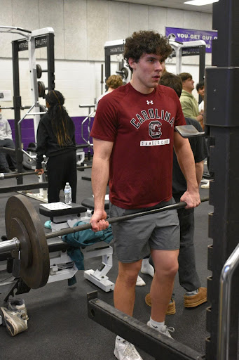 Senior Nick Caywood performs Romanian Deadlifts in the weight room on Jan. 17. 