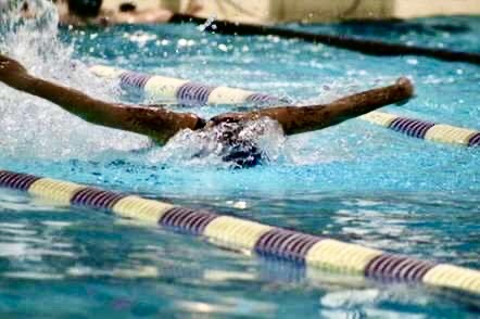 Junior Allie Farello swims in the 100 butterfly race on Jan. 13 where she earned 4th place.